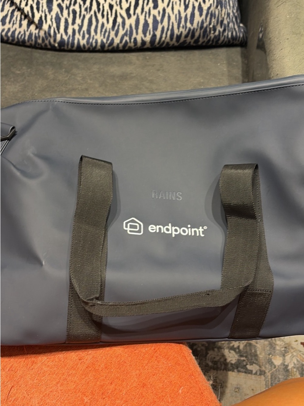 Rains Navy Duffel with Black Webbed Handles